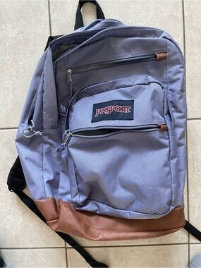 Jansport purple Backpack with Brown Trim and Black Straps
